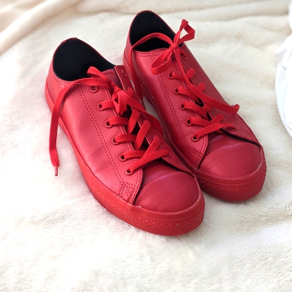 All Red Rubber Converse sneakers